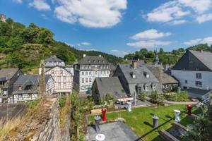 an aerial view of a town with buildings at Stadthaus Monschau Aqua&Blue (14 Gäste) in Monschau