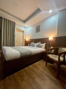Letto o letti in una camera di YULOKO GUEST HOUSE