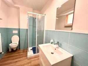 Koupelna v ubytování Vittoria Apartament