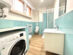 Koupelna v ubytování Vittoria Apartament