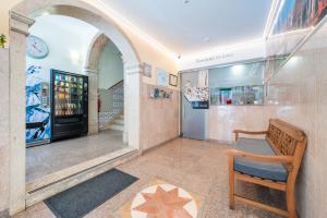 a room with a chair and a star on the floor at Norte Guest House in Lisbon