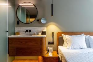 Letto o letti in una camera di Bob W Eolou