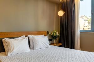 Letto o letti in una camera di Bob W Eolou
