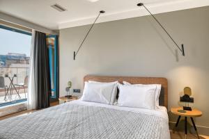 Letto o letti in una camera di Bob W Eolou