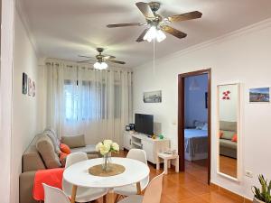 a living room with a couch and a table at Apartamento Salo in Candelaria