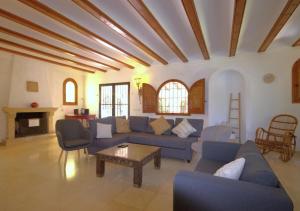 Ein Sitzbereich in der Unterkunft Holiday Home La Cartuja