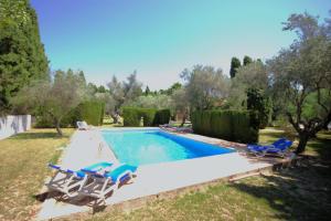 Der Swimmingpool an oder in der Nähe von Holiday Home La Cartuja