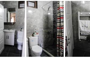 Koupelna v ubytování Ayvalık Mutlu Köy'de sakinliğin adresi + 29 fotografií