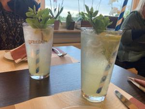 two glasses of drinks sitting on a table at SchöneWohnung mit eigenem Gsrten und Eingang in Schwentinental
