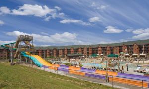 a water park with a water slide and a pool at Wyndham Glacier Canyon 2 BR in Baraboo