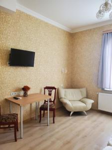 TV a/nebo společenská místnost v ubytování Gogi's Paradise Guesthouse