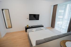 Ένα ή περισσότερα κρεβάτια σε δωμάτιο στο Tranquil Living nearby Parcul Politehnicii