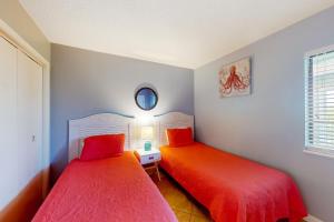 Ένα ή περισσότερα κρεβάτια σε δωμάτιο στο Plantation East #1308 +32 φωτογραφίες