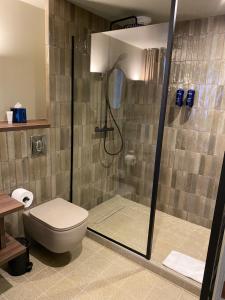 Koupelna v ubytování Hôtel L'Adresse - Entièrement rénové