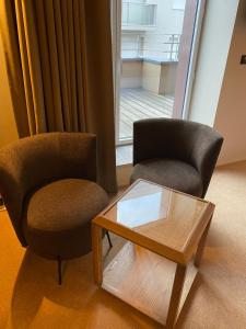 Posezení v ubytování Hôtel L'Adresse - Entièrement rénové