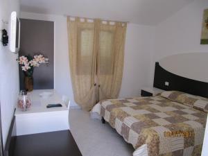 Posteľ alebo postele v izbe v ubytovaní Residence Olbia