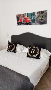 Postel nebo postele na pokoji v ubytování Hotel Barbato