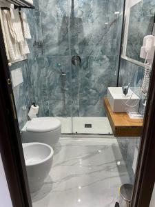 Koupelna v ubytování Hotel Barbato
