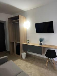 TV a/nebo společenská místnost v ubytování Hotel Barbato
