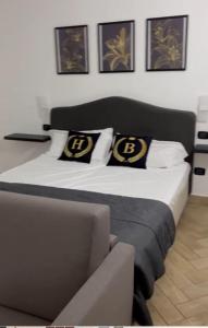 Postel nebo postele na pokoji v ubytování Hotel Barbato