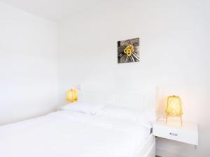 Łóżko lub łóżka w pokoju w obiekcie Live Tata Casa con jardin y vistas