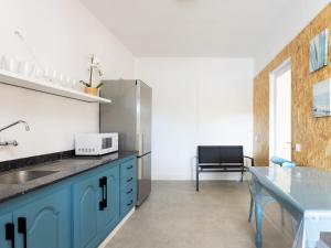 Kuchnia lub aneks kuchenny w obiekcie Live Tata Casa con jardin y vistas
