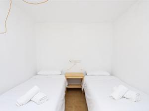 Łóżko lub łóżka w pokoju w obiekcie Live Tata Casa con jardin y vistas