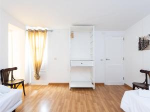 Łóżko lub łóżka w pokoju w obiekcie Live Tata Casa con jardin y vistas