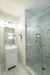 a bathroom with a shower and a sink at 06 The Mollino Room - A PMI Scenic City Vacation Rental in Chattanooga