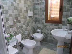 Kúpeľňa v ubytovaní Residence Olbia