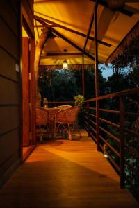 Een balkon of terras bij Coffee Cradle Wayanad Luxuorios Private Tree House - Inside 2 Acre Coffee Plantation