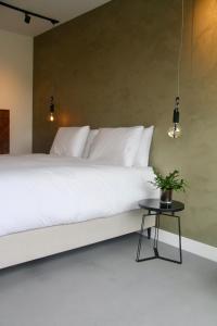 Letto o letti in una camera di Onze Kas