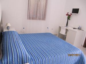 Posteľ alebo postele v izbe v ubytovaní Residence Olbia
