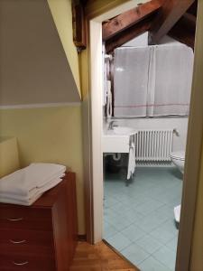 Koupelna v ubytování Hotel PALAS