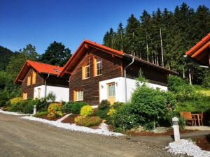 a wooden house on the side of a road at Holiday home in Gaal im Murtal in a beautiful setting in Pirkach