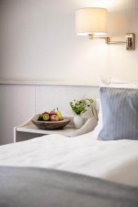 Postel nebo postele na pokoji v ubytování Hotel Ilmenautal inklusive THERMEplus
