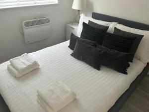 Un ou plusieurs lits dans un hébergement de l'établissement Modern 1 bed flat in the heart of Hackney