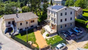 an aerial view of a house with a solar roof at Casa Coletta in Bosco Chiesanuova