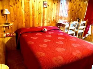 Postel nebo postele na pokoji v ubytování B&B Maison Vallomy