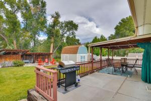 a backyard with a grill and a patio at Bright Ranch-Style Retreat in Downtown Buena Vista in Buena Vista