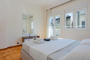 Giường trong phòng chung tại Luxury Downtown Apartment Z1