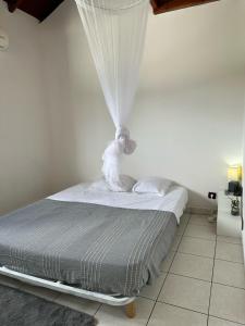 Posteľ alebo postele v izbe v ubytovaní Guadeloupe Guesthouse
