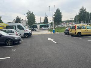 a parking lot filled with lots of cars at Champions home in Sarcelles
