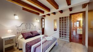 Posteľ alebo postele v izbe v ubytovaní Casa rural El Veredero