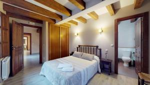 Posteľ alebo postele v izbe v ubytovaní Casa rural El Veredero