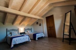 Posteľ alebo postele v izbe v ubytovaní Casa rural El Veredero