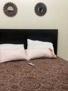 Postelja oz. postelje v sobi nastanitve Moderna Suite en Machala