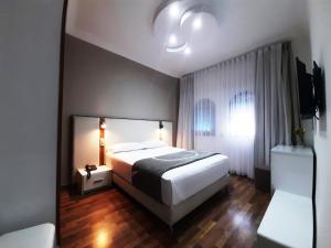 Postel nebo postele na pokoji v ubytování Balcon Bleu