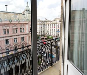 a view from a window of a city street at Danubius Hotel Astoria City Center in Budapest