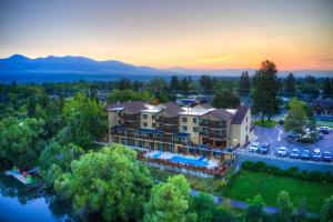 an aerial view of a resort building with a pool at The Pine Lodge on Whitefish River, Ascend Hotel Collection in Whitefish
